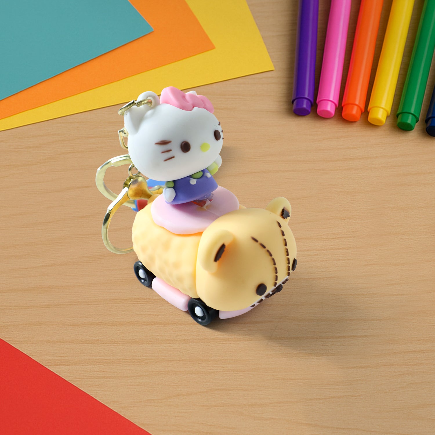 Cute Cartoon Cat Riding Toy Car Silicone Keychain (1 Pc)